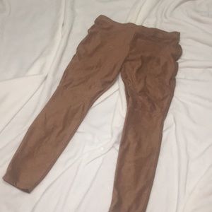 Tan Suede leggings.